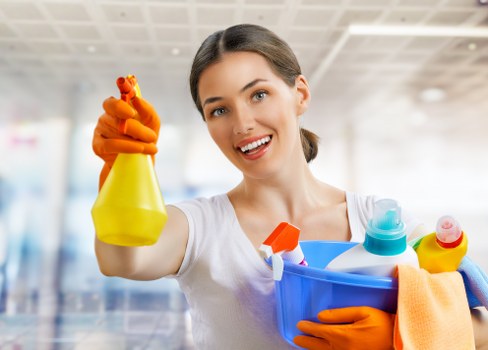 Cleaning process in progress on a carpeted floor area