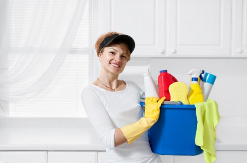 Cleaner leaving a freshly cleaned carpet area safely prepared